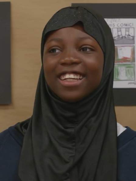 young girl from primary school relaxed and laughing as part of a primary futures event