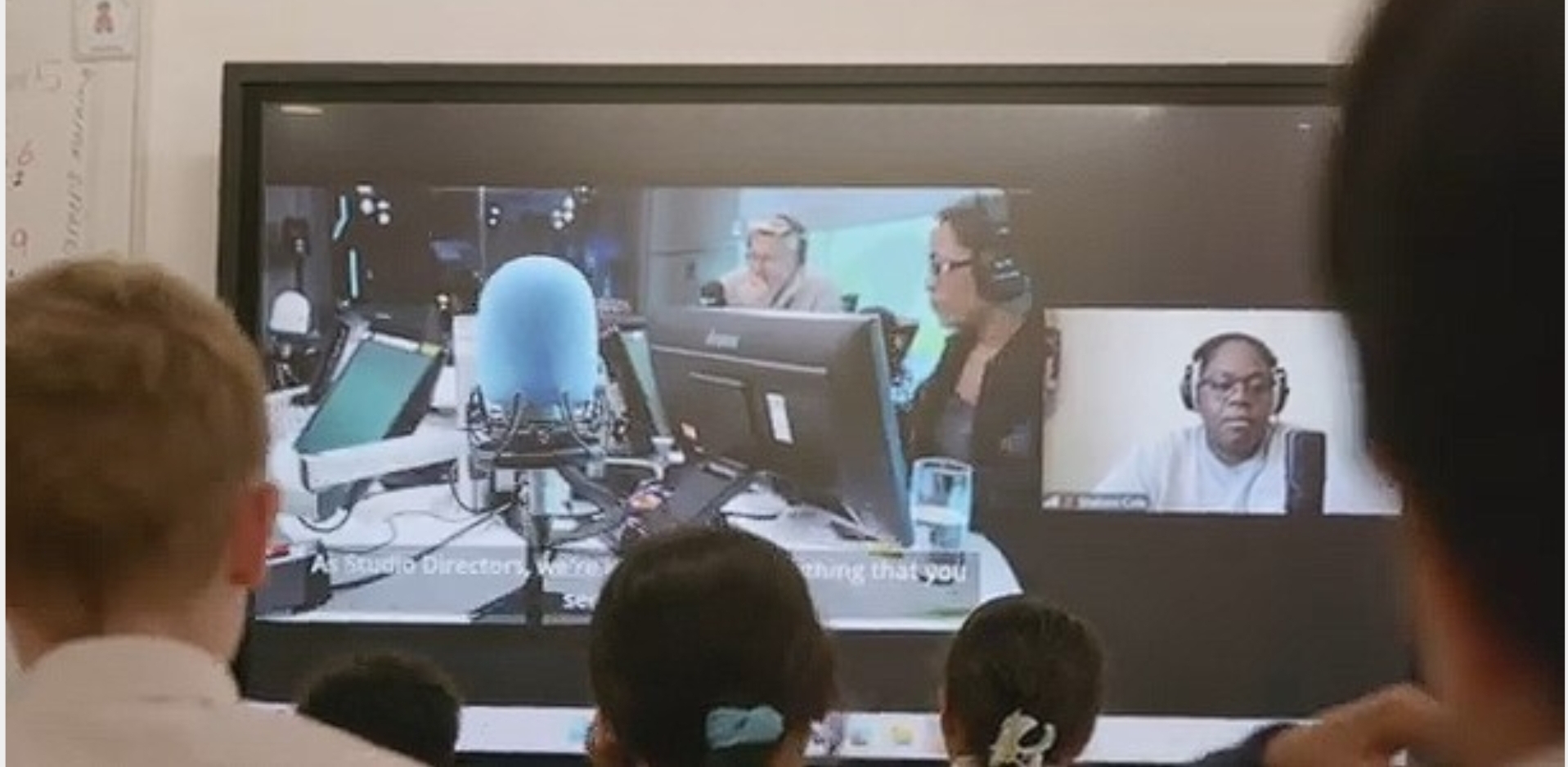 Virtual event in school with a lady from media production talking about her role  with a mic and equipment in the foreground.